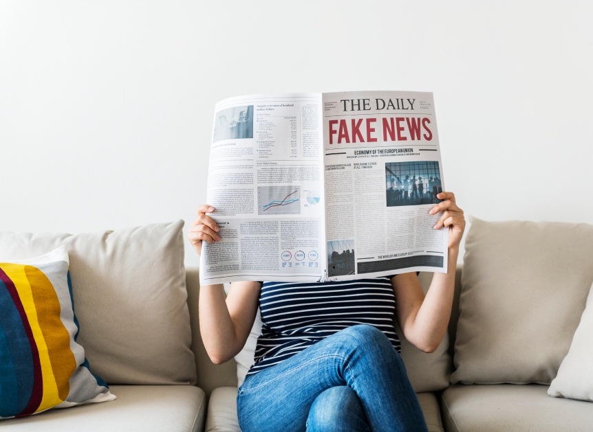 woman reads fake news